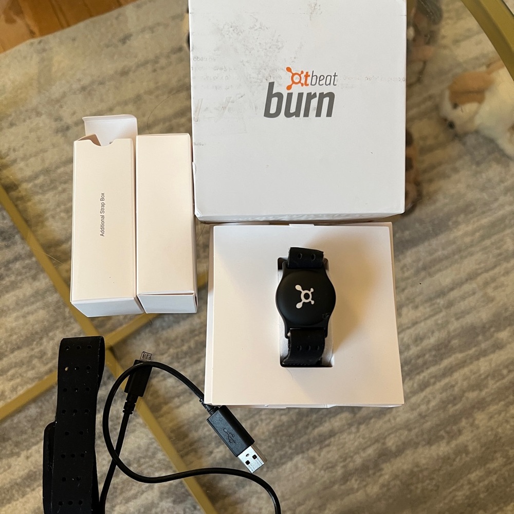 Great condition ORANGE THEORY HEART MONITOR. Pre-owned with box.